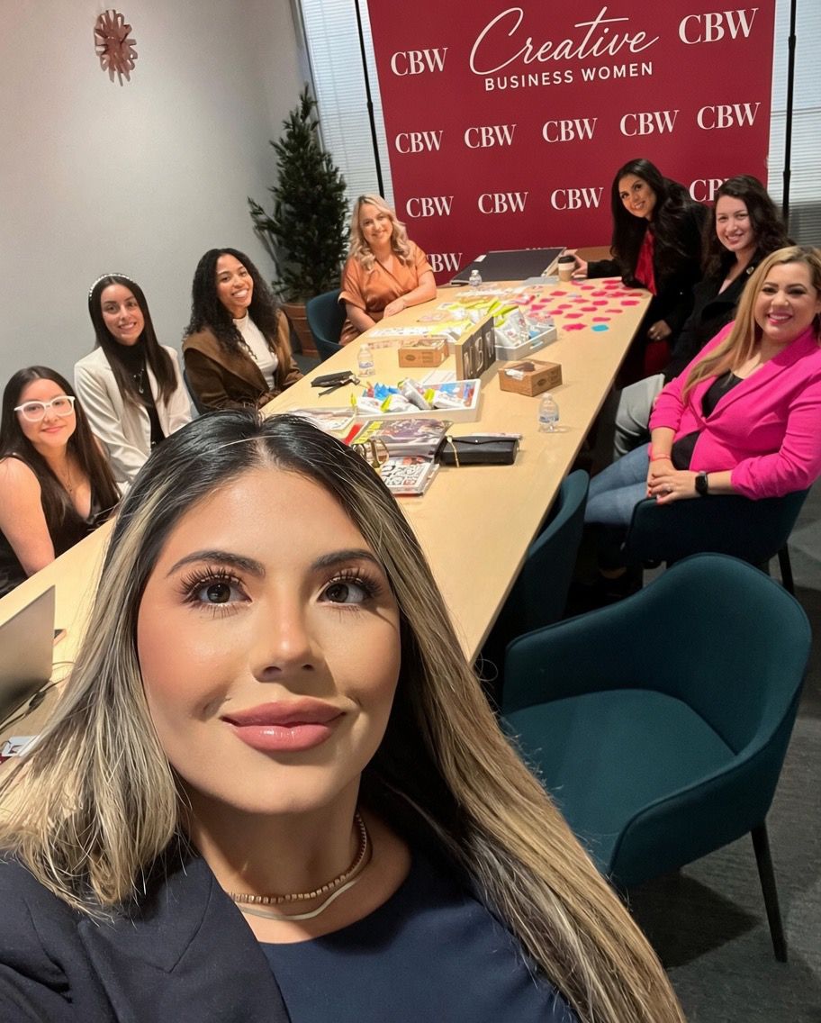 Misa Caba with a group of women